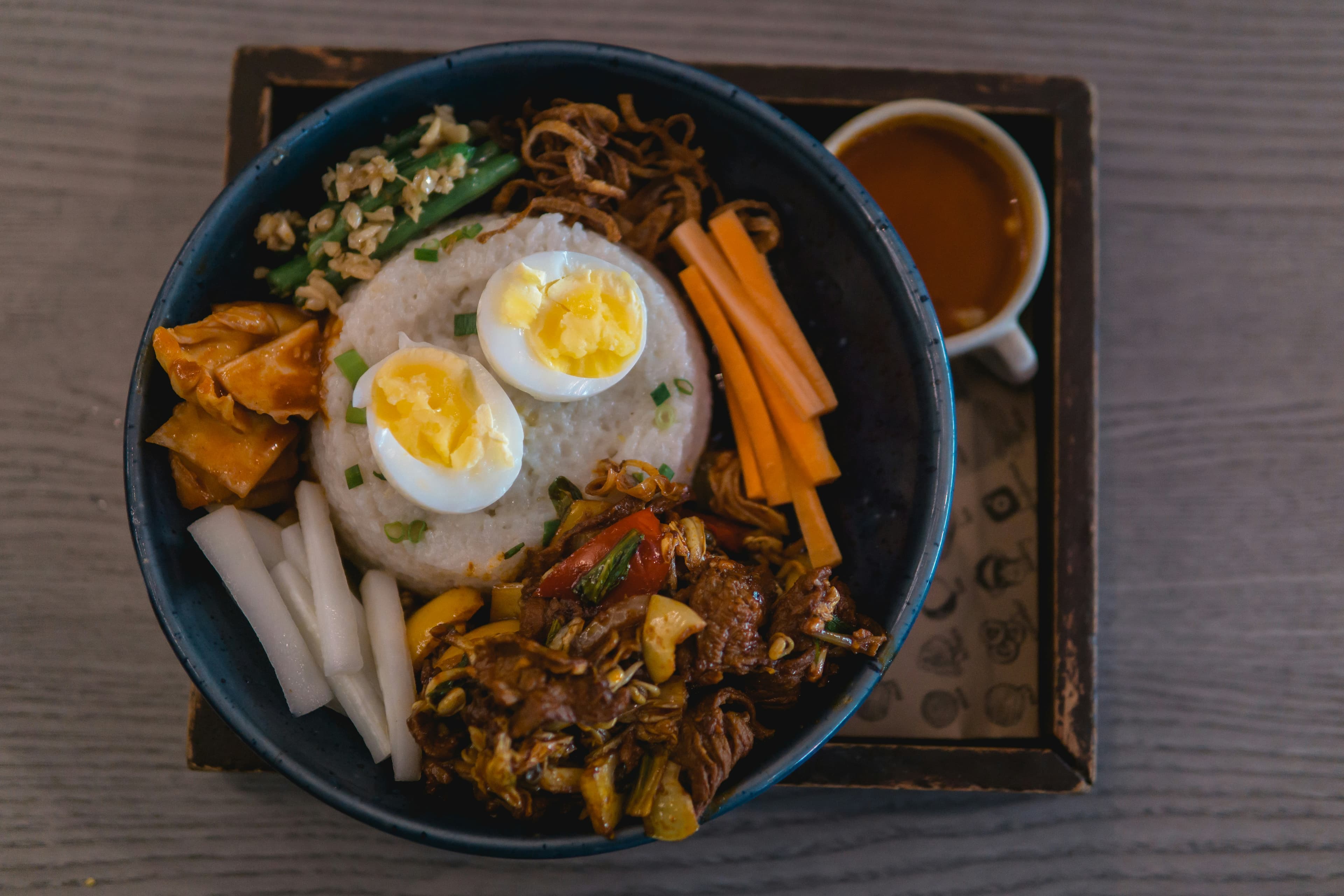 Korean street food stall with tteokbokki and other snacks