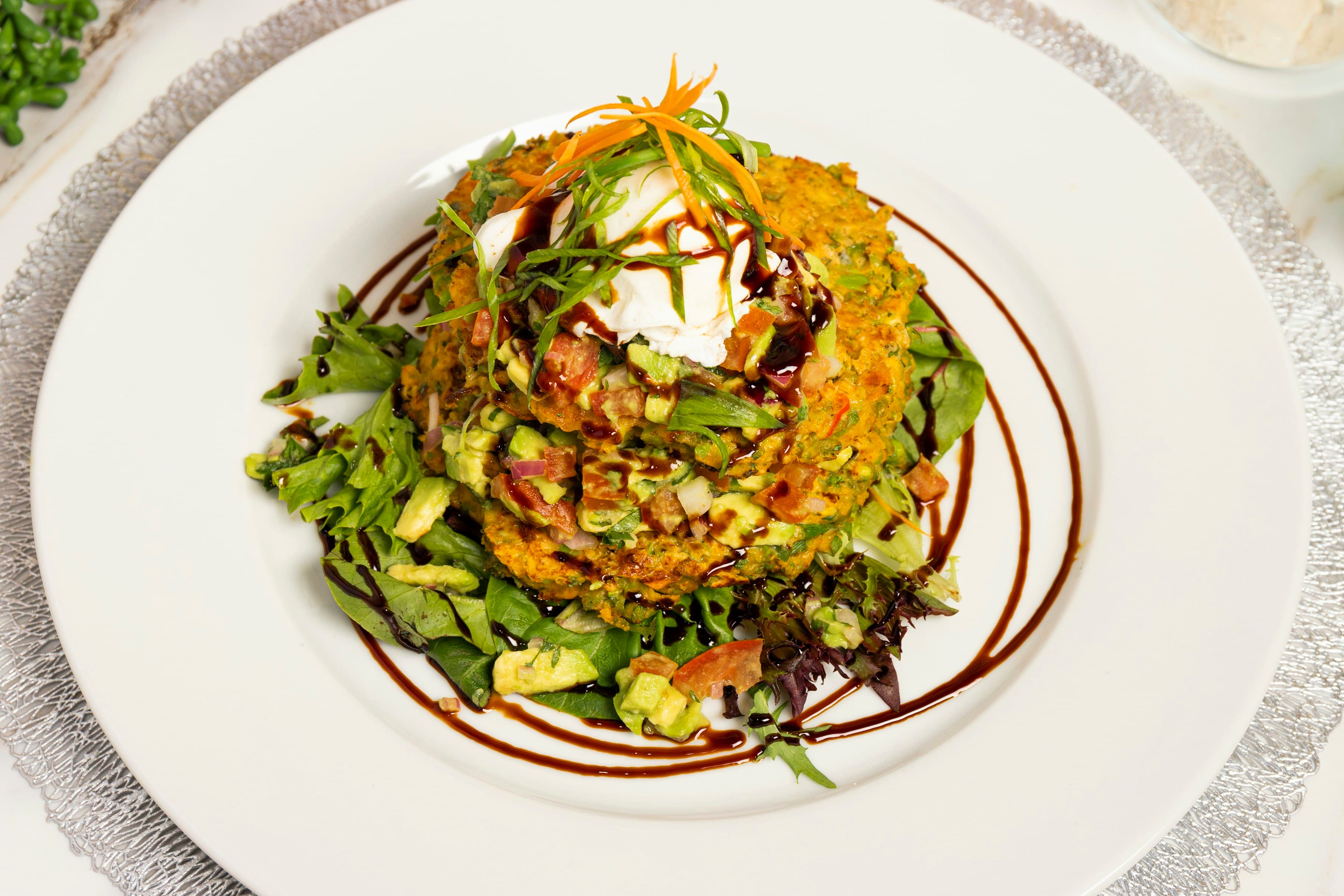 Crispy bean croutons on a fresh green salad